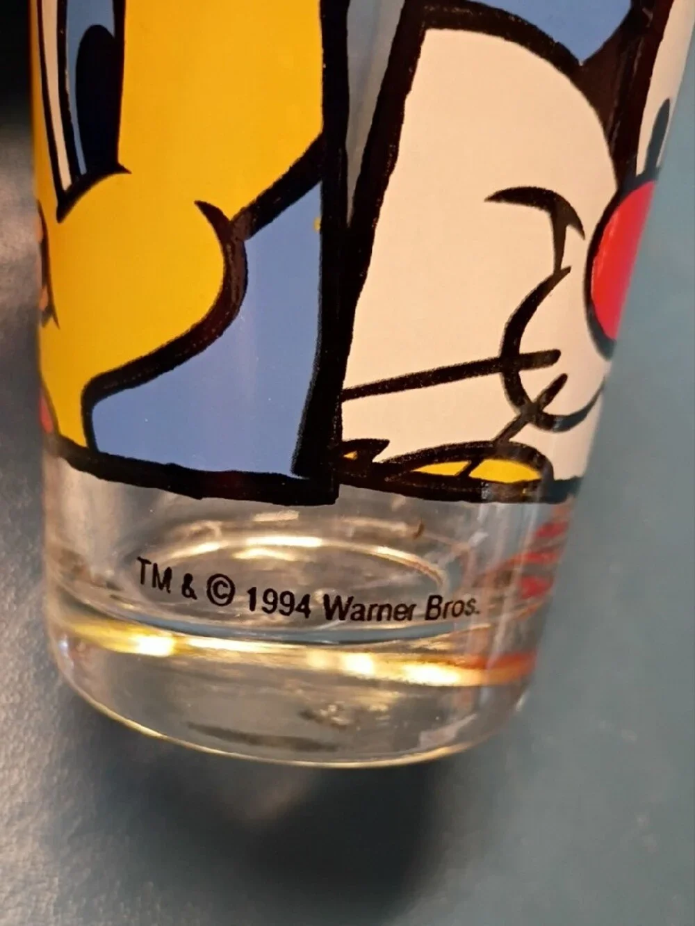 Warner Bros. Sylvester Cartoon Juice Glass with Red Nose and Blue/Yellow Panels